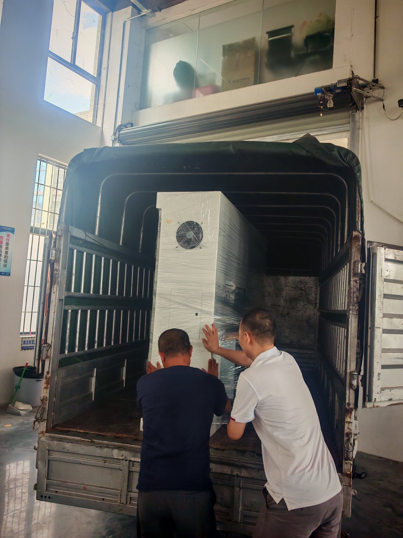 Industrial control cabinet packaged for delivery