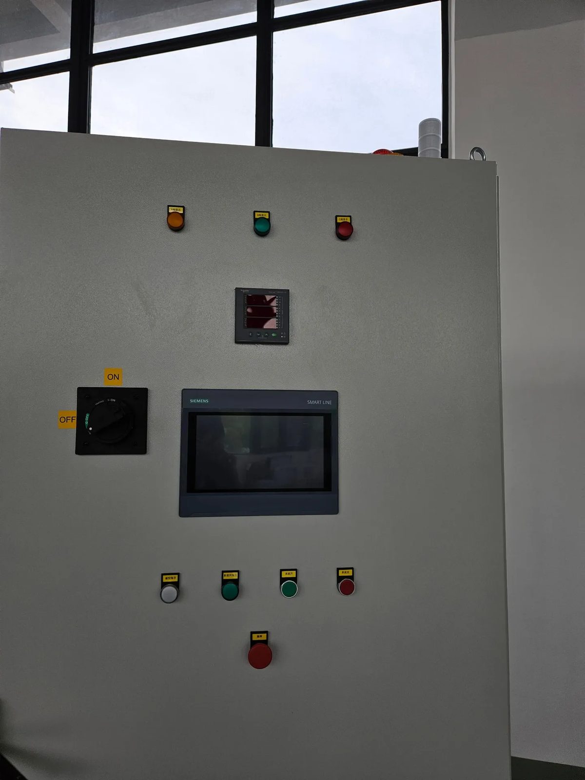 Schneider low-voltage components inside sludge dewatering panel