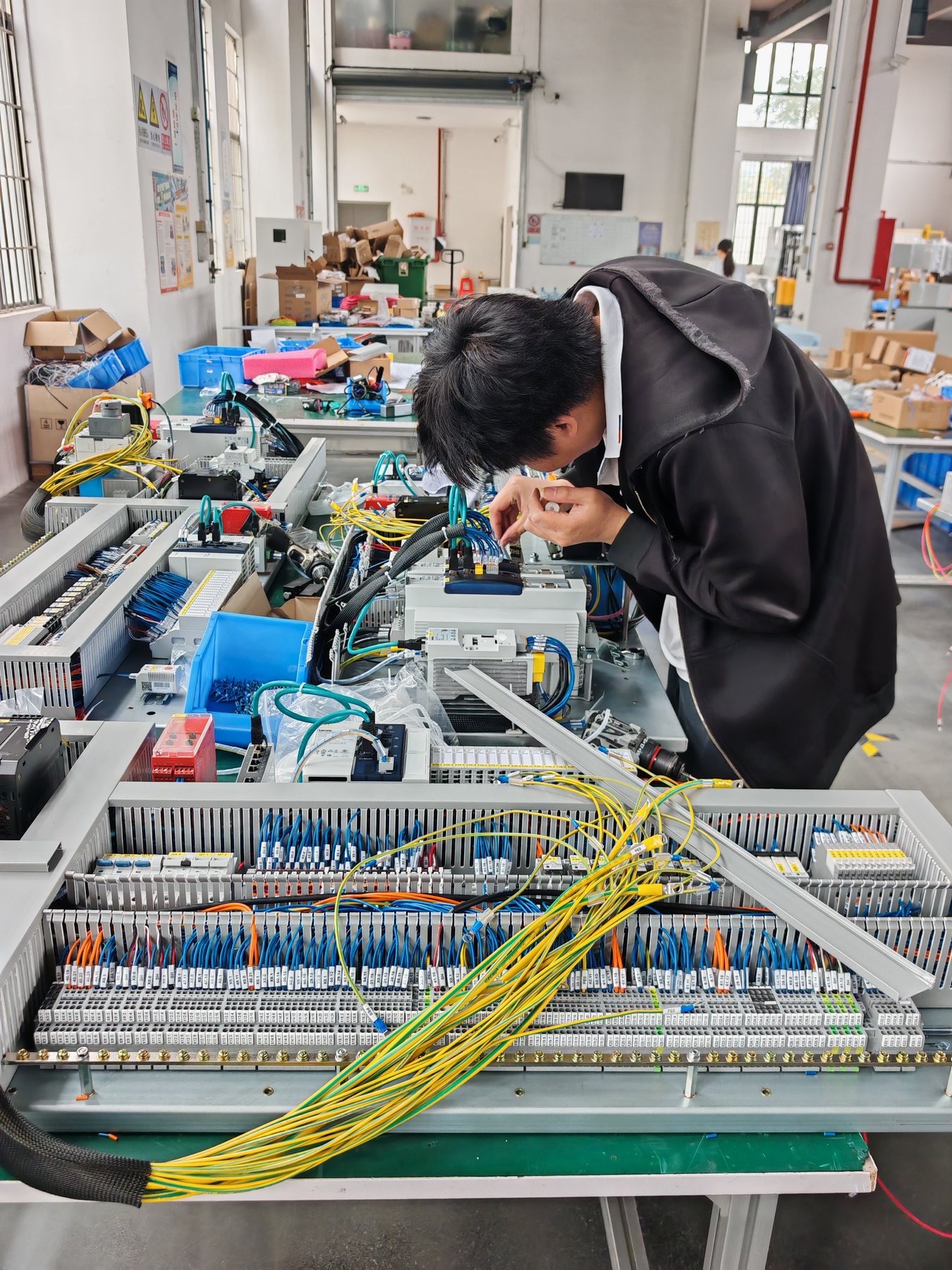 Factory assembly testing and commissioning process for industrial control cabinets